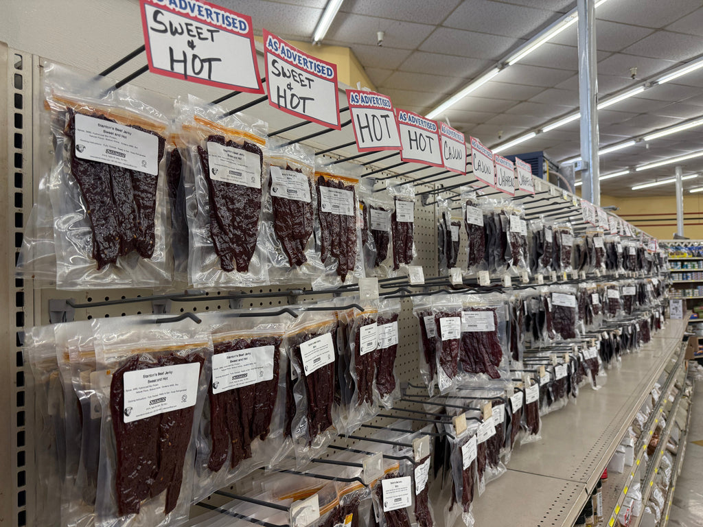 Stanton's Beef Jerky wall display with multiple flavors