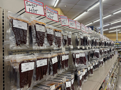 Stanton's Beef Jerky wall display with multiple flavors