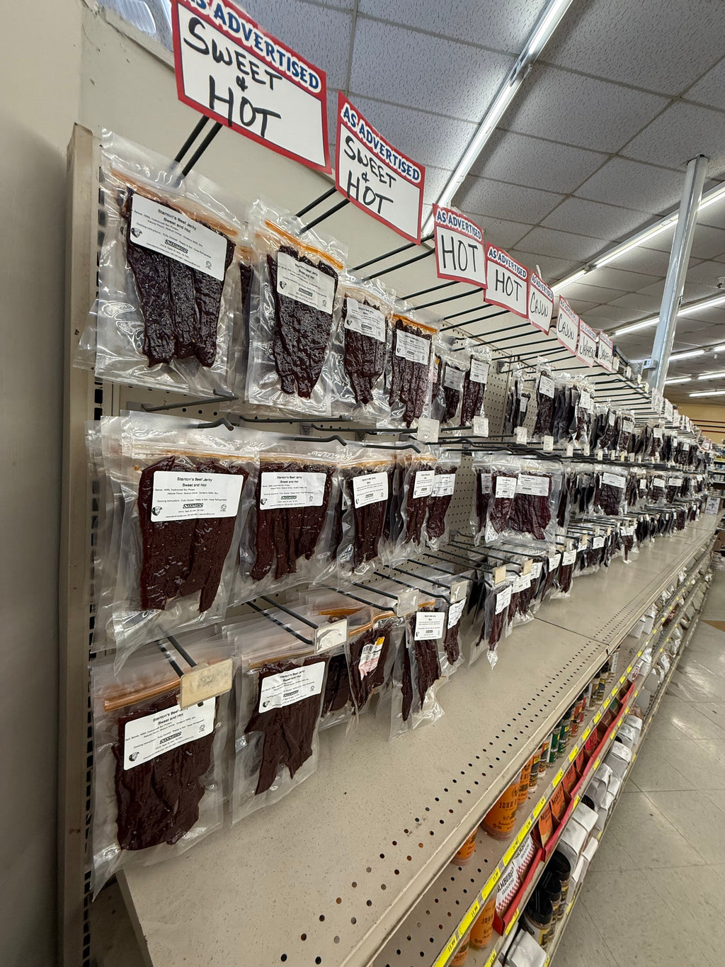 Stanton's Beef Jerky shelf with Sweet & Hot and Hot varieties