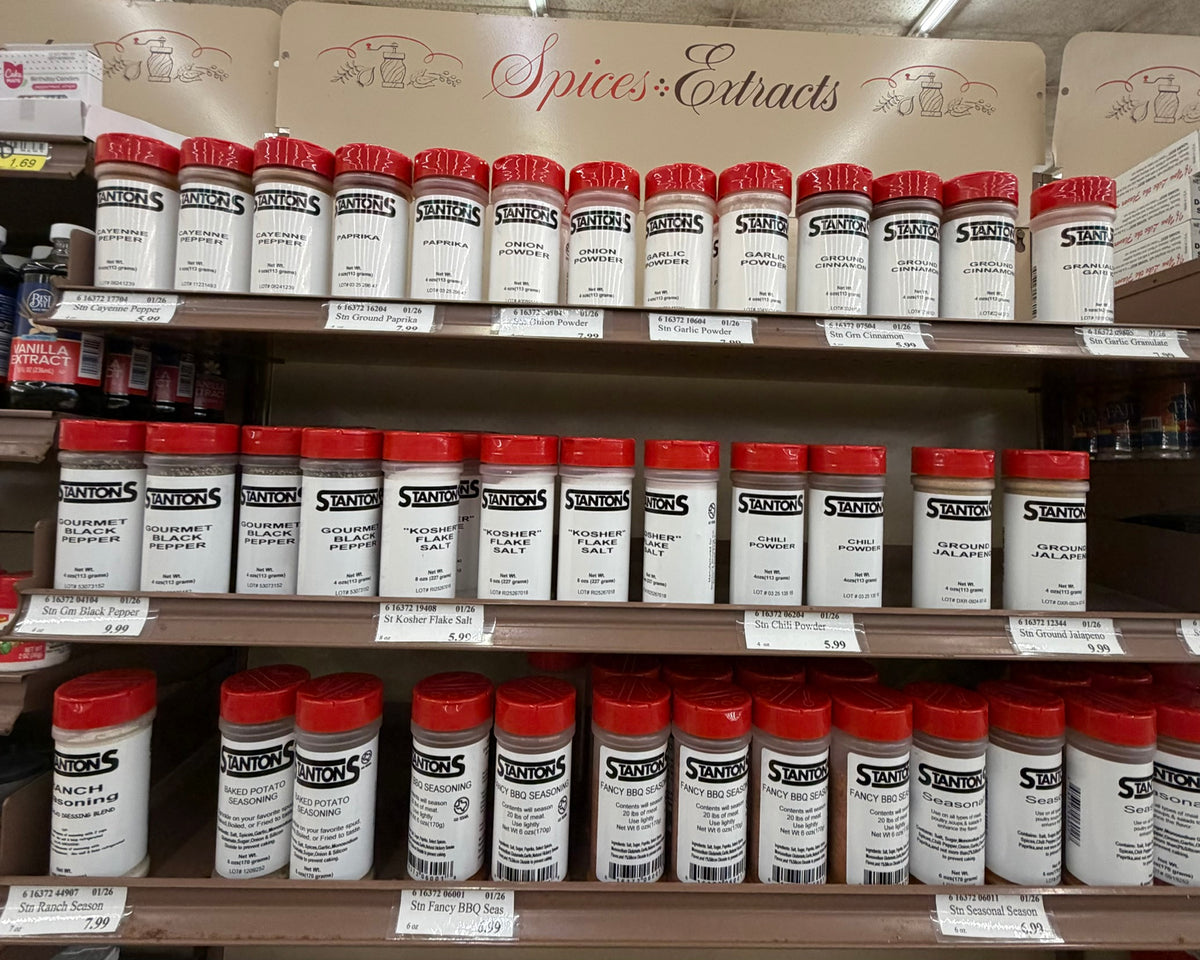 Stanton's Spices & Extracts shelf display with multiple seasoning varieties